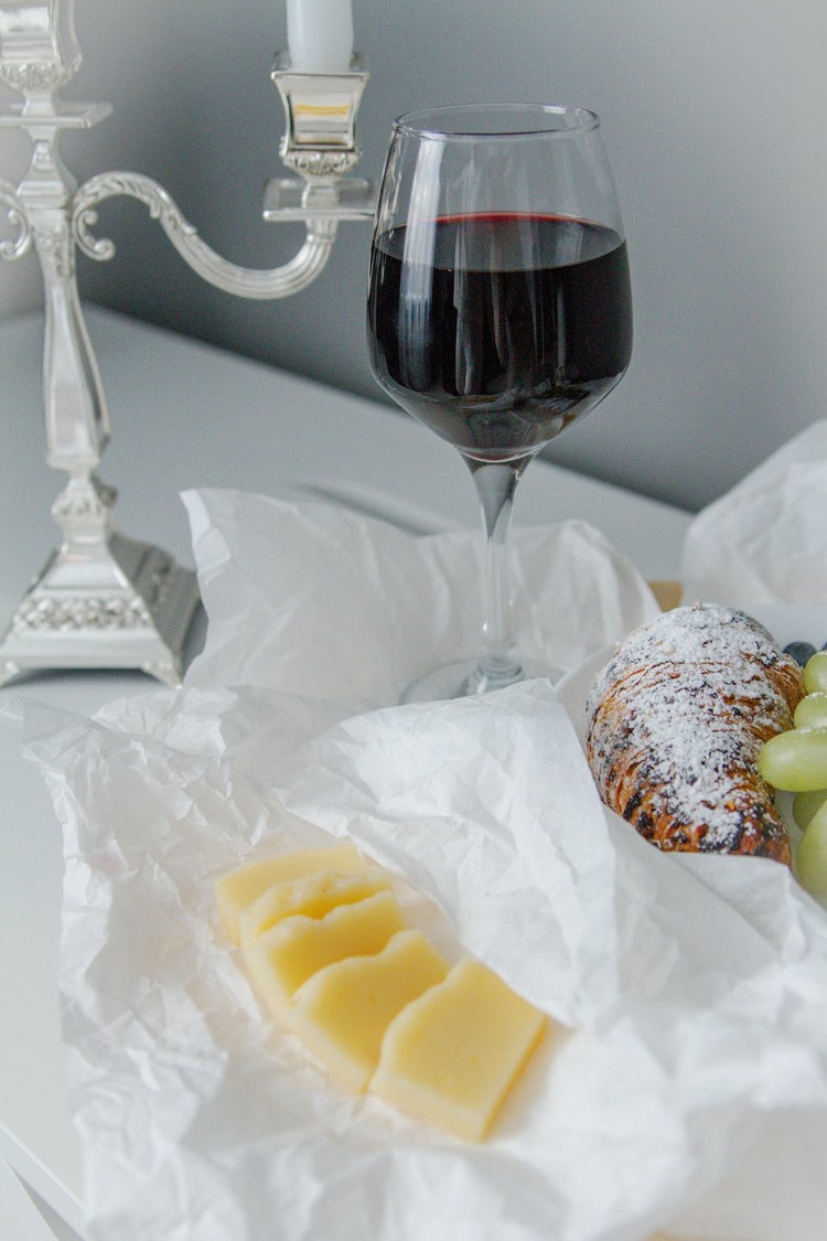Italian Amarone with Sliced Cheese and Almond Croissant